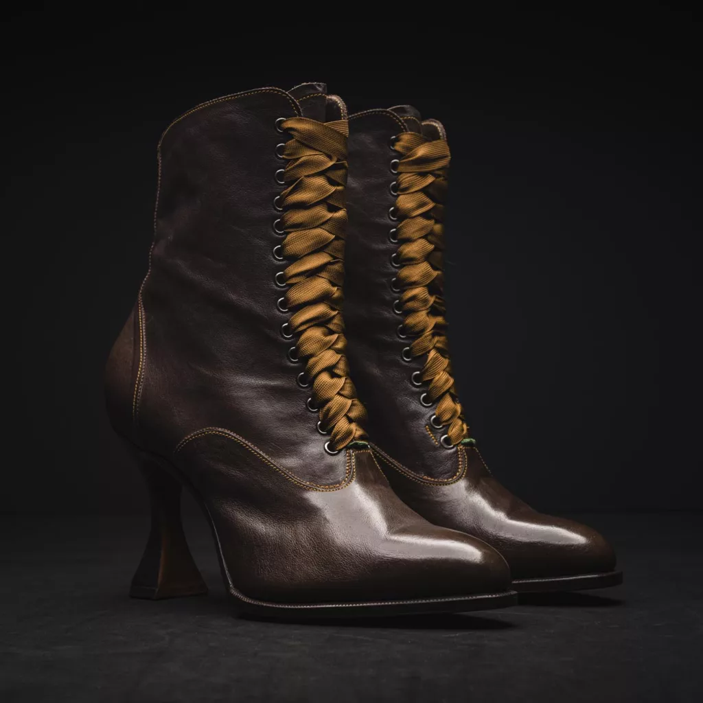 Rokocha A lace up Oxford bootie, in brown calf leather with rich green silk linings, green hand stitch details and deep ochre silk laces through metal eyelets.