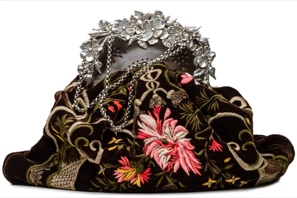 Velvet heavily embroidered evening bag with a vintage frame, silver with floral details.